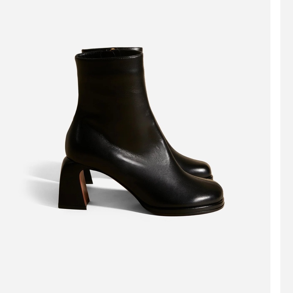 Manu Atelier black leather ankle boots with sculptural heels